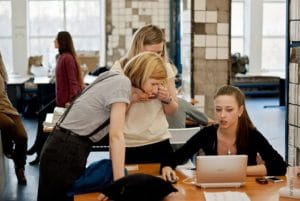 coworkers interacting in the office