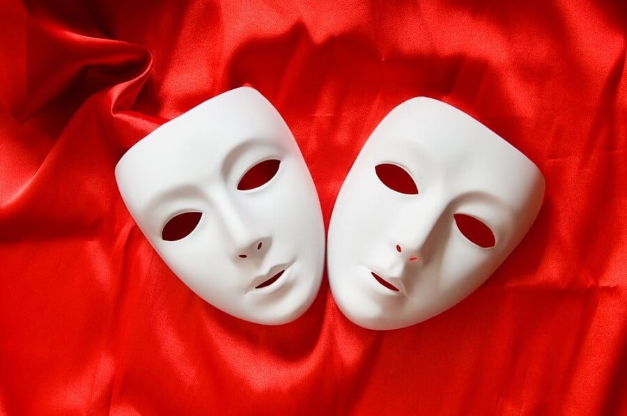 white masks on a red sheet