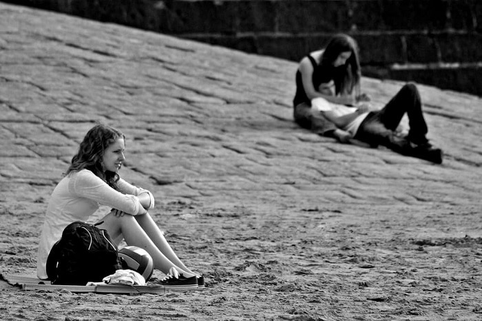 black and white photo of a lone girl 