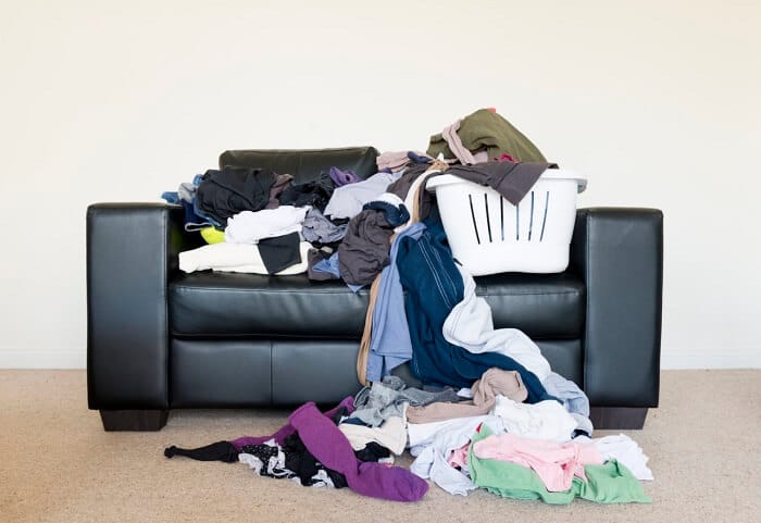 Messy hoarder couch