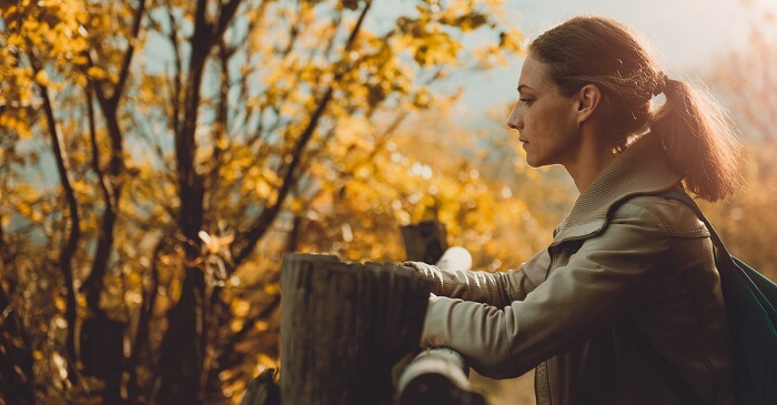 Woman contemplating nature